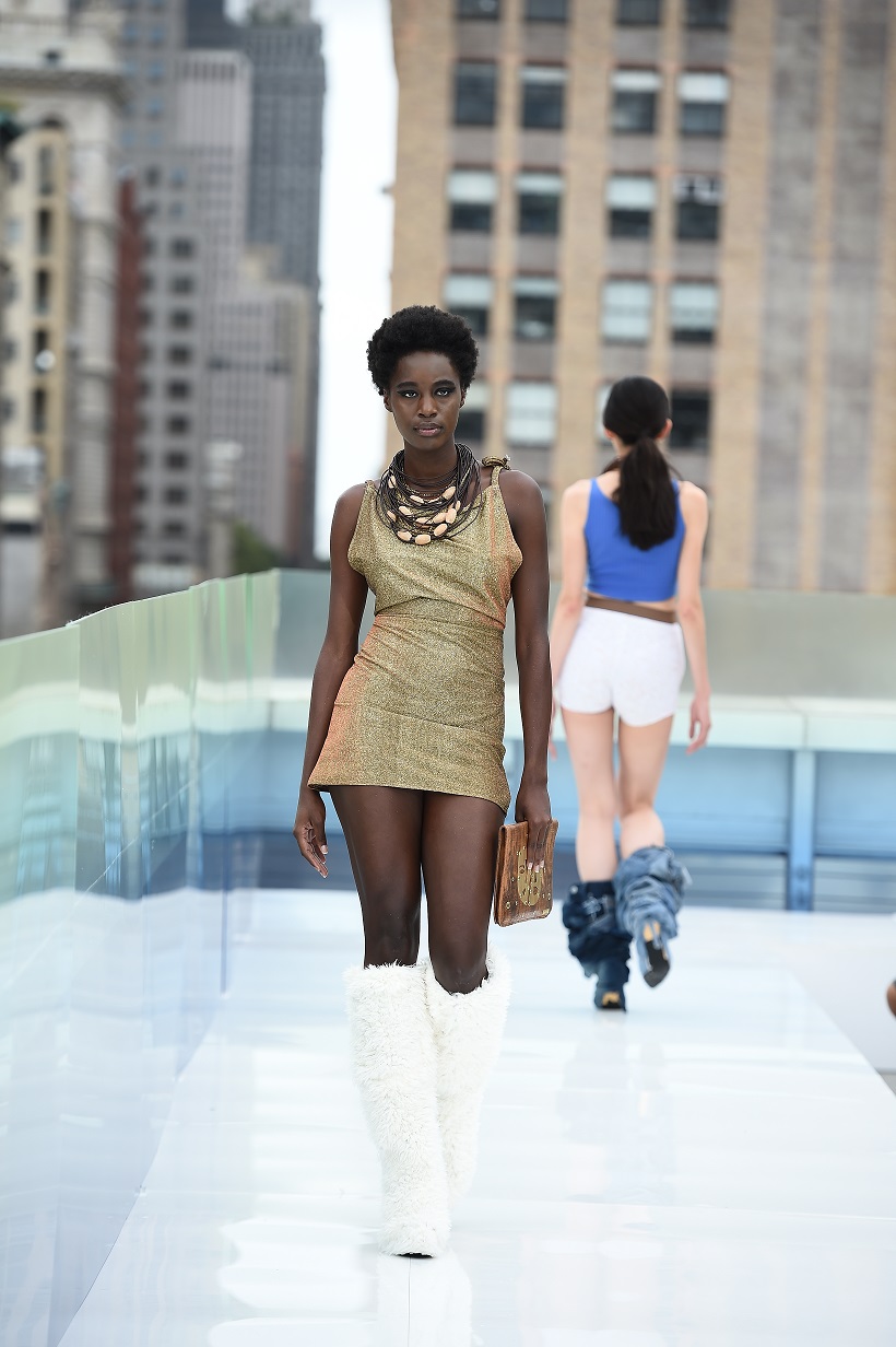 Model in Zuri Perle Idoma Necklace and Iboju clutch new york fashion week runway accessories