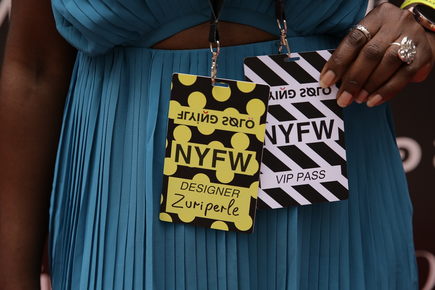 Atinuke Adeleke Owner Zuri Perle on the red carpet at new york fashion week runway accessories Iyun coral Sterling Silver handcrafted statement rings